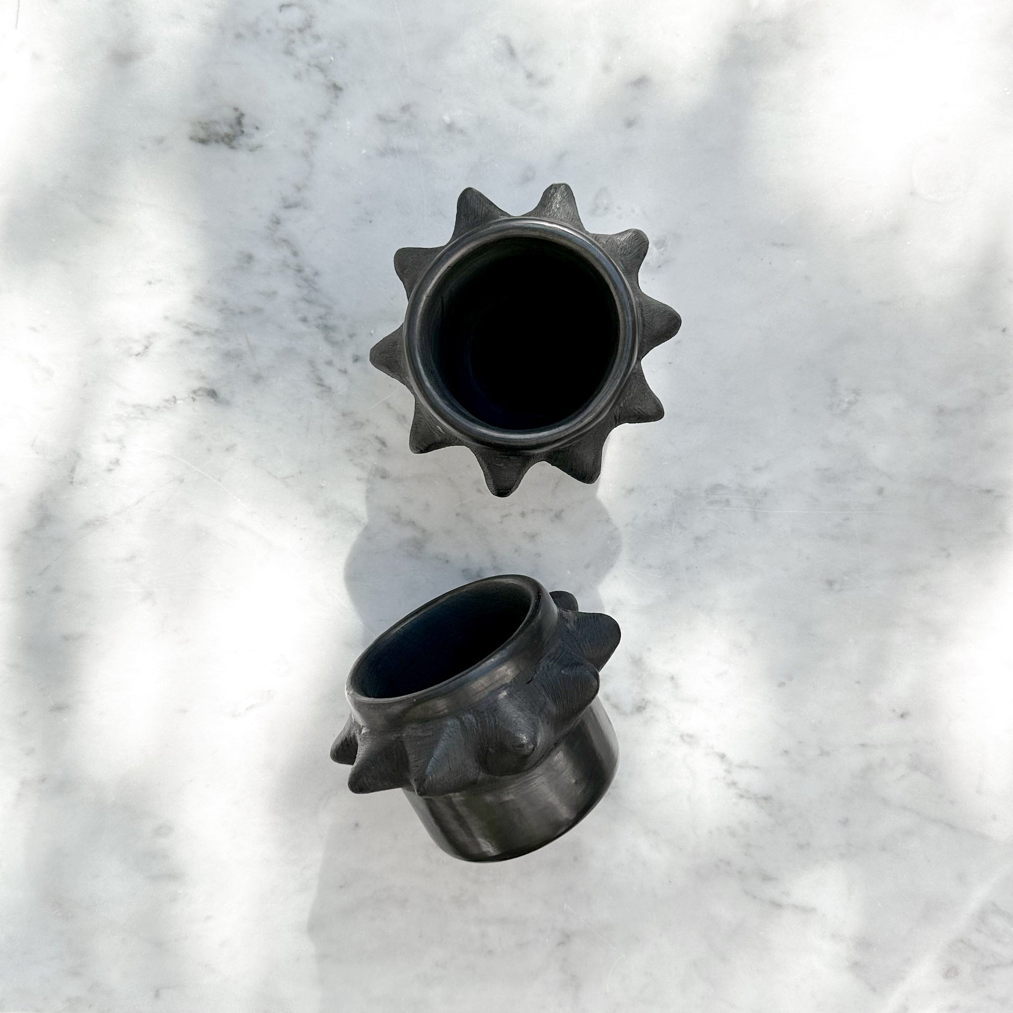 Small black clay spiky cup made in Oaxaca.