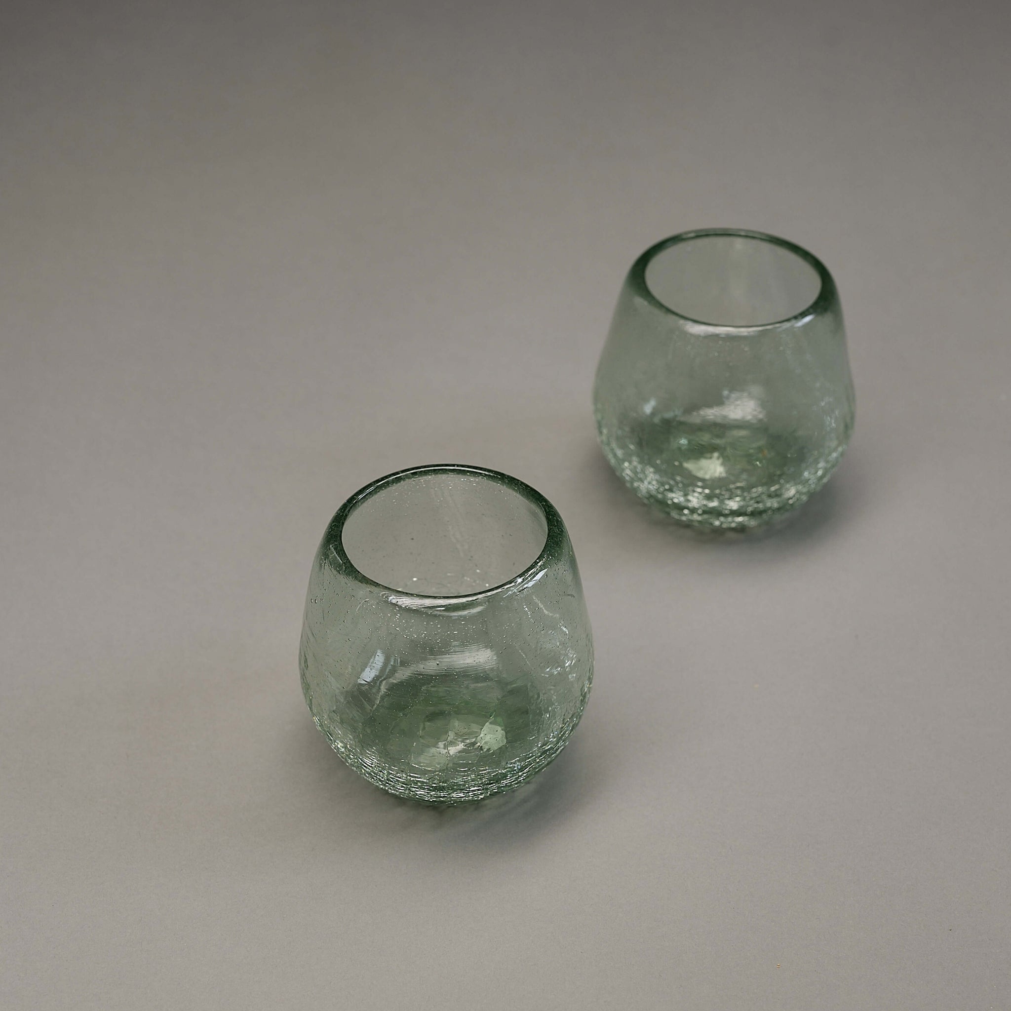 Stemless wine glasses featuring a crackle effect.