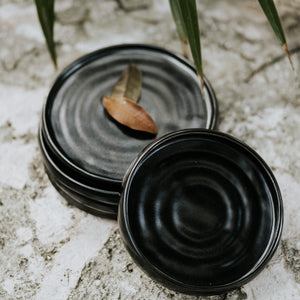 Black stoneware dinner plate.
