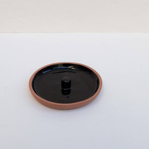 Black terracotta incense holder.