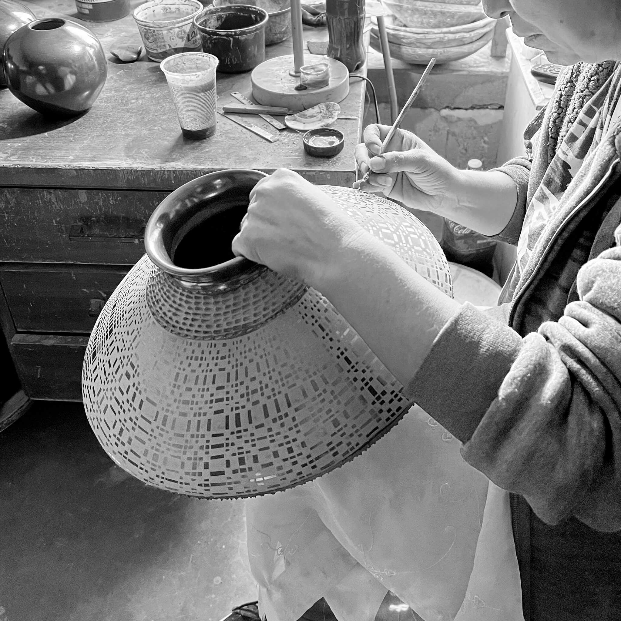 A Mexican artisan creating Mata Ortiz pottery.