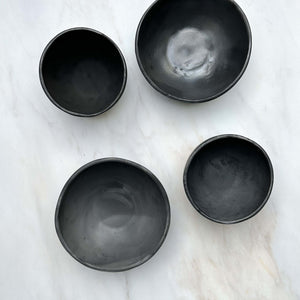 A series of Oaxaca black clay bowls.