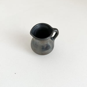 Oaxaca black clay small creamer.
