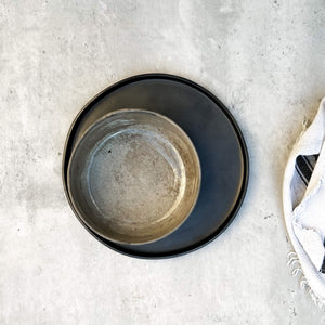 Oaxaca pottery, including a smoked clay bowl paired with a black clay salad plate.