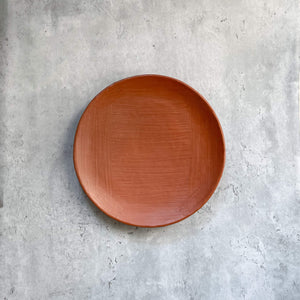 A Oaxaca red clay salad plate.