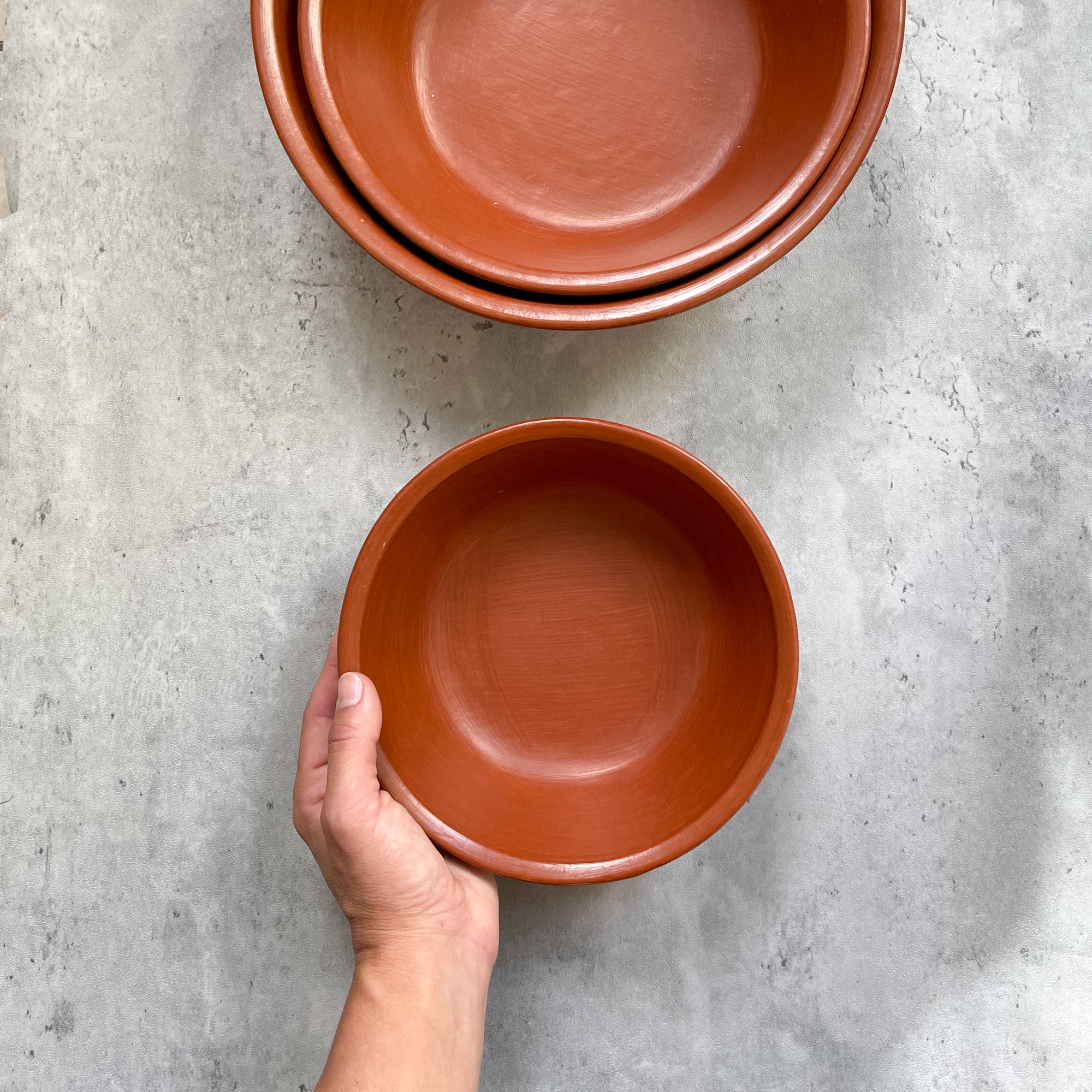 A small Oaxaca red clay serving bowl.
