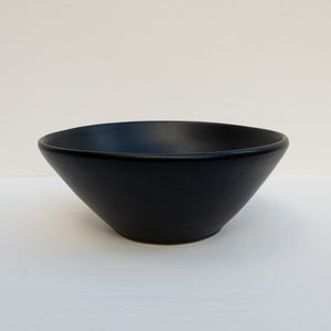 The Artesanal matte-black stoneware serving bowl. 