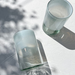 Handblown glass tumblers made in Mexico with white dipped finish.