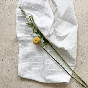 White cotton napkins with white stitching made in Oaxaca.